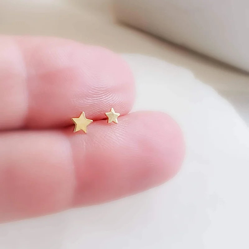 Women's stud earrings-Tiny 14K Gold Star Studs