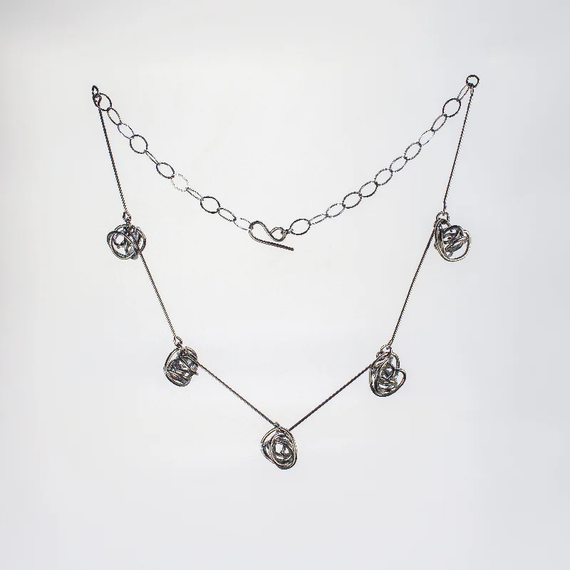 Women's celestial necklaces-NEW! Five Knot Necklace in Oxidized Silver by Rina Young