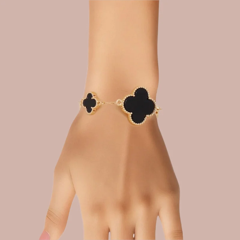 Women's vintage-inspired bangles-Black Gold Quatrefoil Bracelet – Elegant and Dainty Jewelry